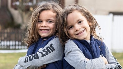 With cochlear implants, 7-year-old twins embrace school, play and life.