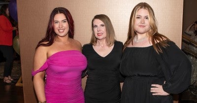 Gloria Moucheron (center), cancer survivor and honoree, with her daughters Madeleine (left) and Skylar (right).