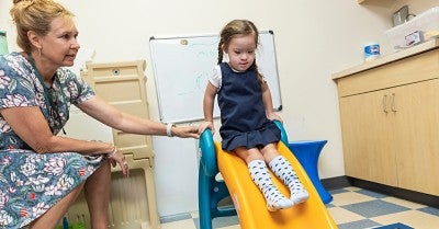 Providing comprehensive, multidisciplinary and holistic care to people with Down syndrome and their families